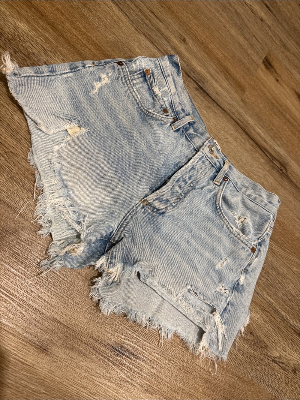 Agolde Light Blue Distressed Denim Cutoff Shorts